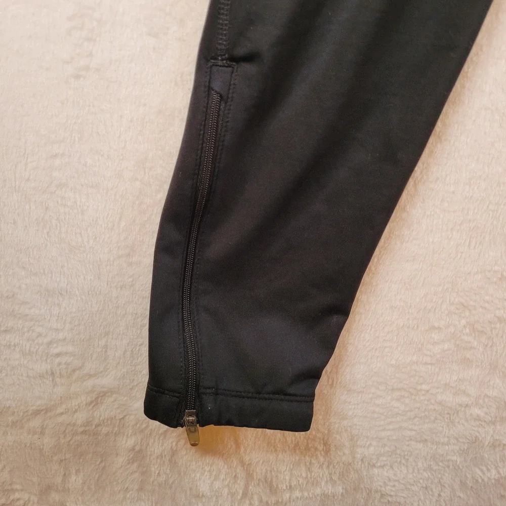 Nike Dri Fit Womens Black Running Athletic Pants Zip Ankle M